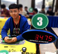 3x3 Single Solve World Record holder Yusheng Du https://ruwix.com/blog/yusheng-du-record-347/yusheng-du-record.jpg